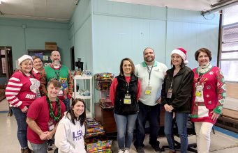 Team Members Of Cypress Bayou Casino Hotel Spread Holiday Cheer: Part Deaux