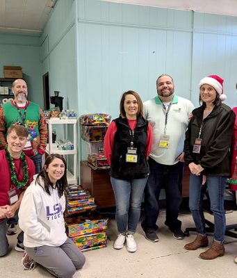 Team Members Of Cypress Bayou Casino Hotel Spread Holiday Cheer: Part Deaux